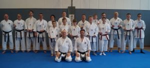 Seminar participants successfully tested for Kobudo kyu grades with instructors in the center, Michael Stenke (left) and Andreas Plöger (right)